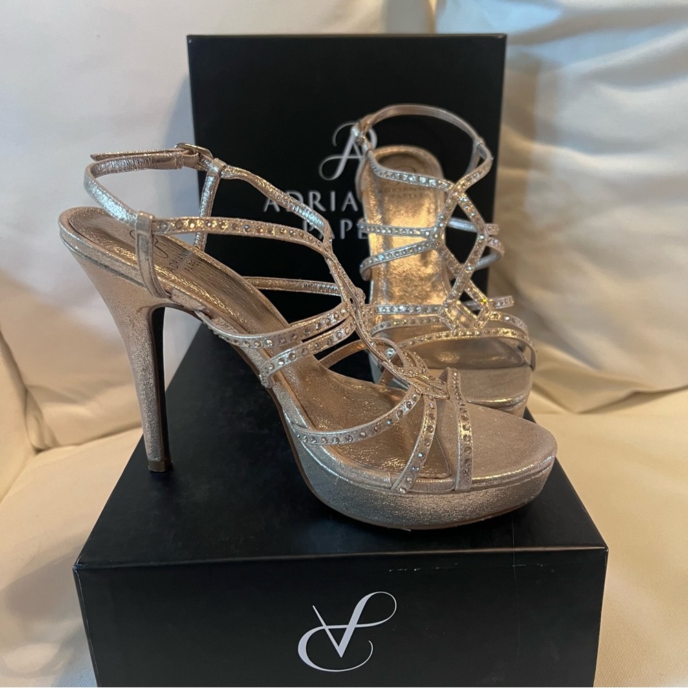 Adrianna Papell size 8 Miranda rhinestone platform sandals in a gold finish.